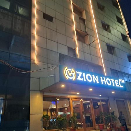 Mg Zion Hotel ตีรูปาติ ภายนอก รูปภาพ