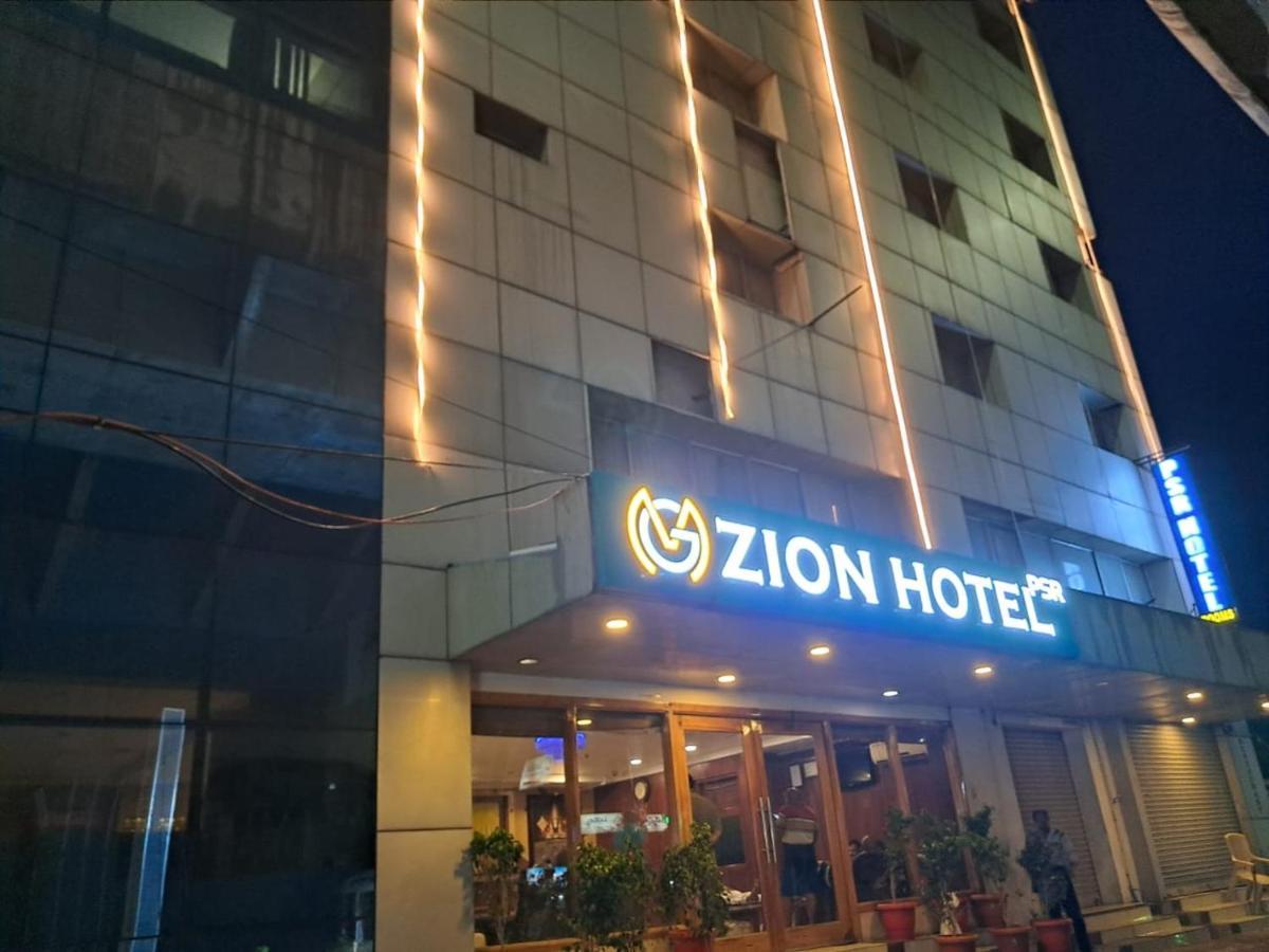 Mg Zion Hotel ตีรูปาติ ภายนอก รูปภาพ