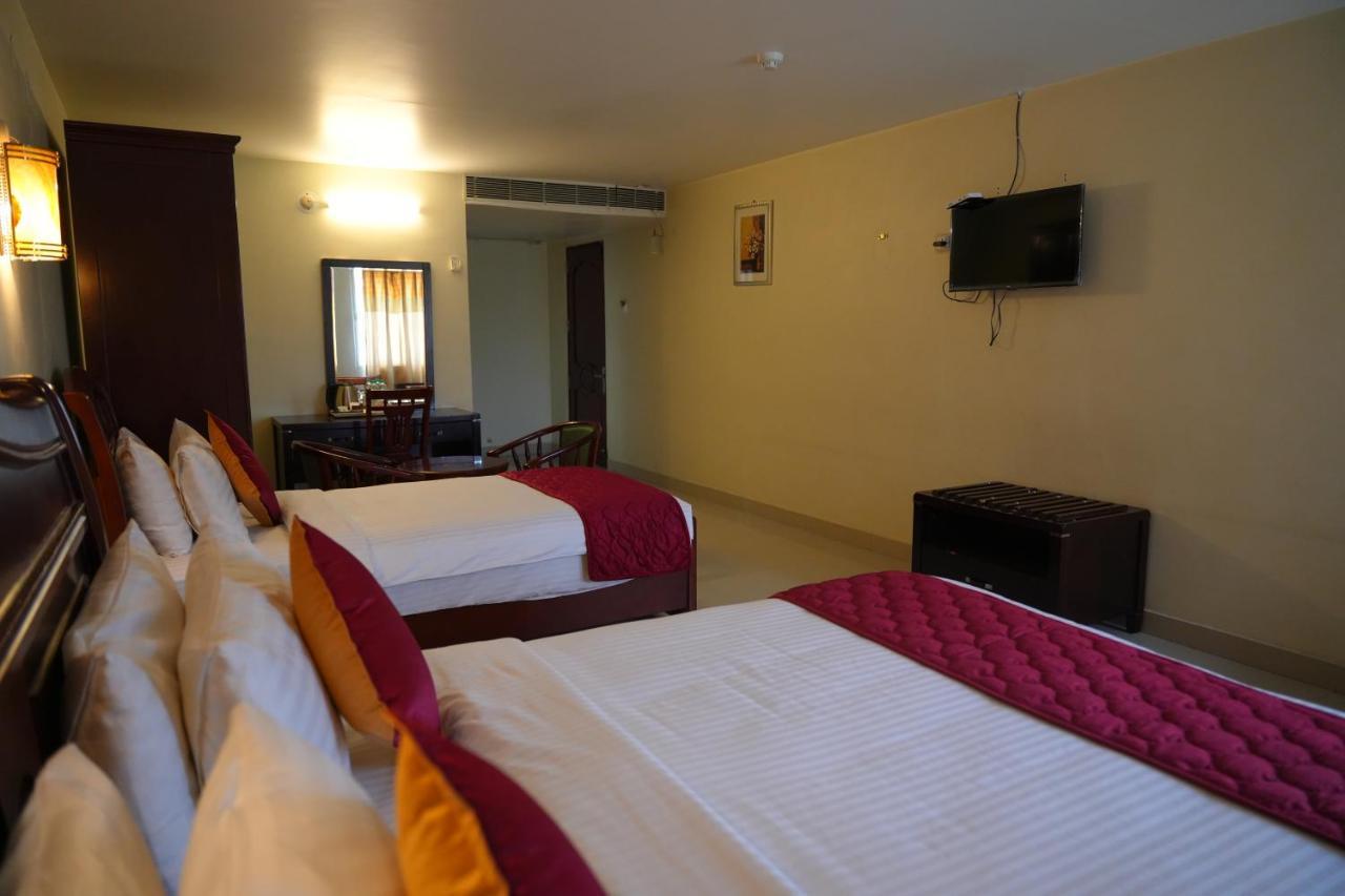 Mg Zion Hotel ตีรูปาติ ภายนอก รูปภาพ