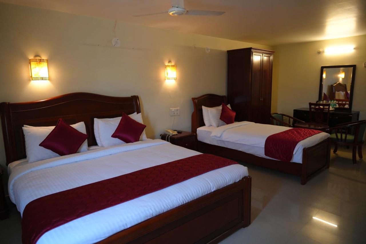 Mg Zion Hotel ตีรูปาติ ภายนอก รูปภาพ